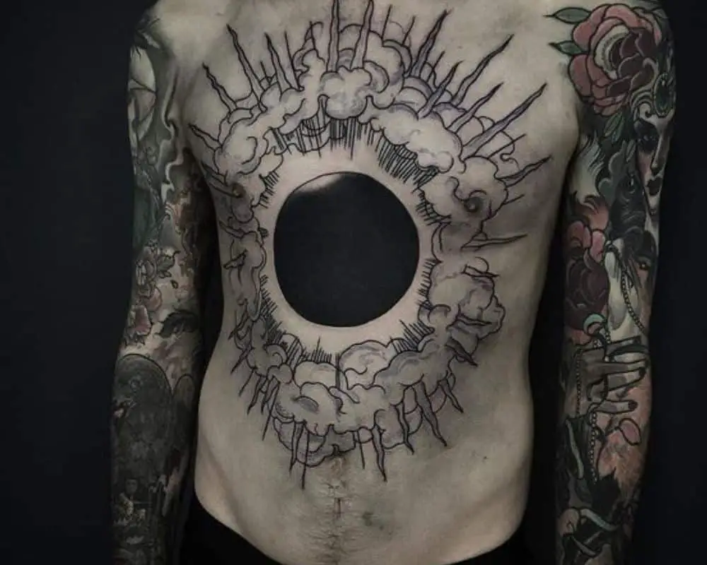 black sun tattoo chest