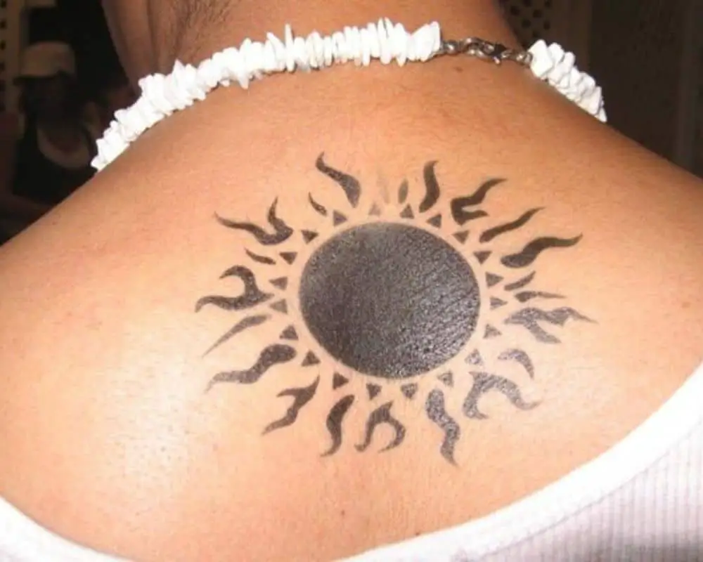 black sun tattoo back