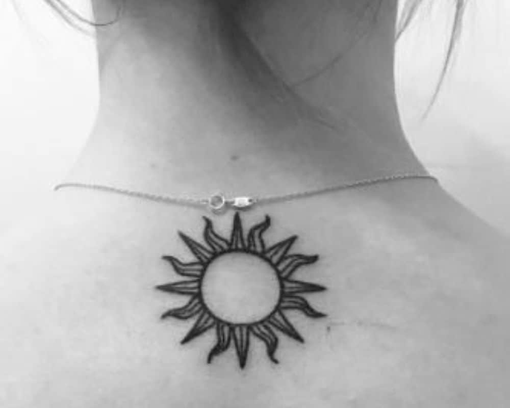 black sun tattoo neck