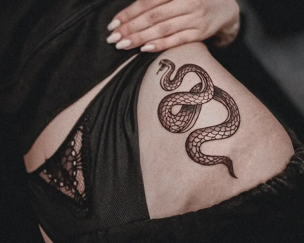 snake tattoos on groin