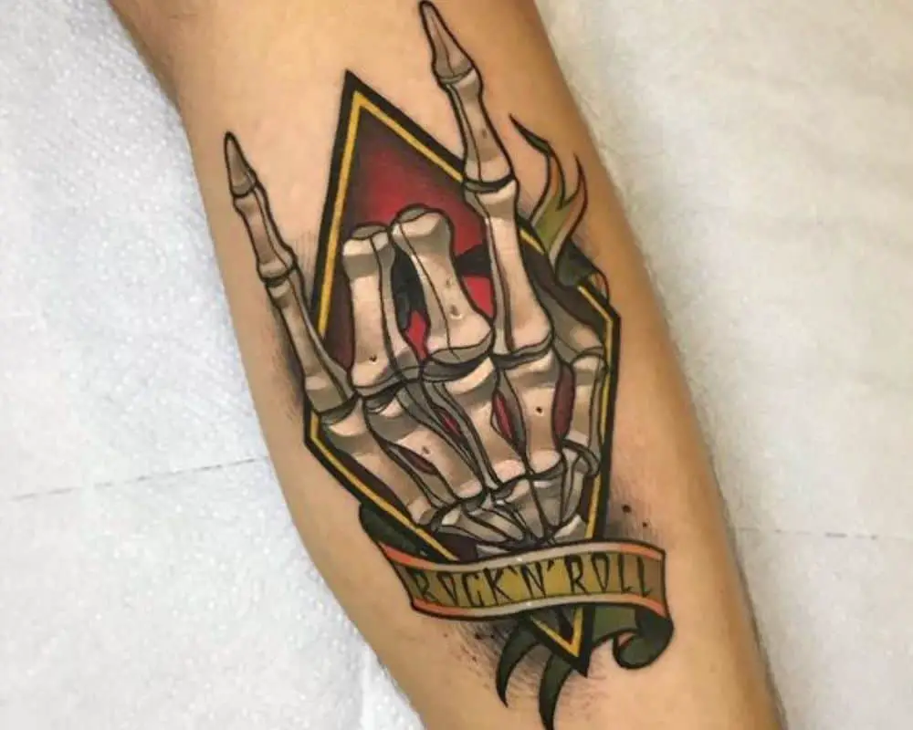 Minimalist Rock Hand Tattoo