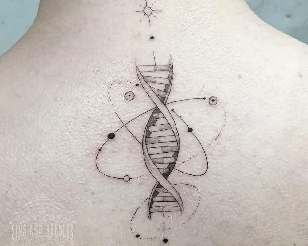 A delicate DNA spiral tattoo on the back