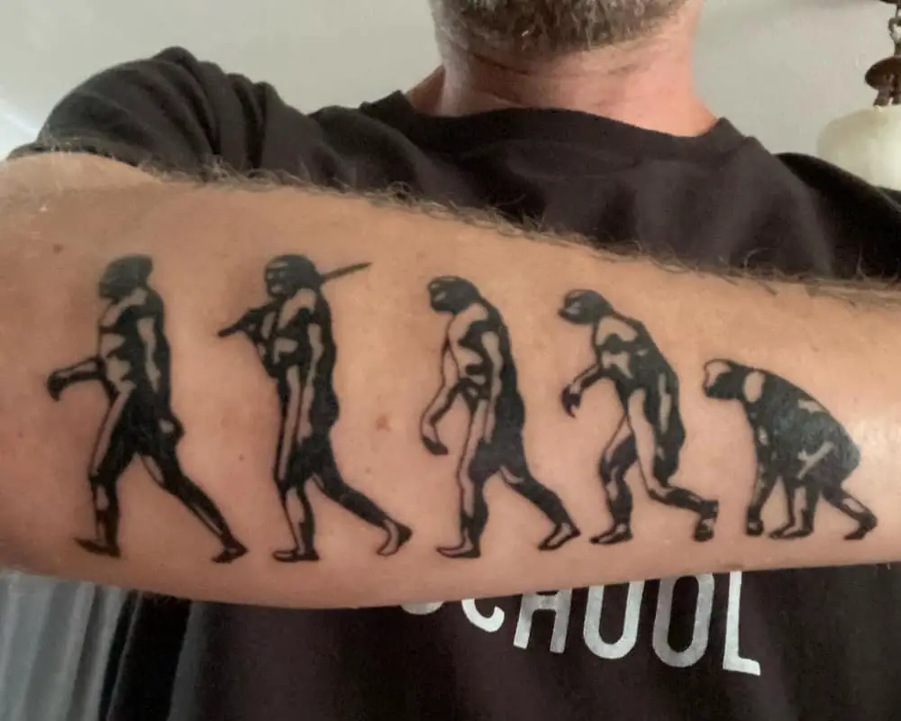 A tattoo depicting Darwin's theory