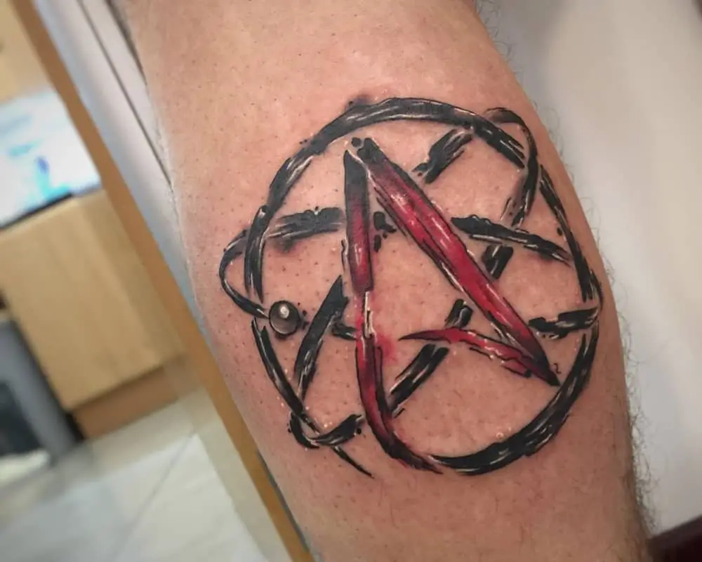 A tattoo depicting an atom as symbol A
