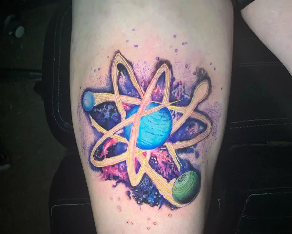 A tattoo depicting an atom from a space object