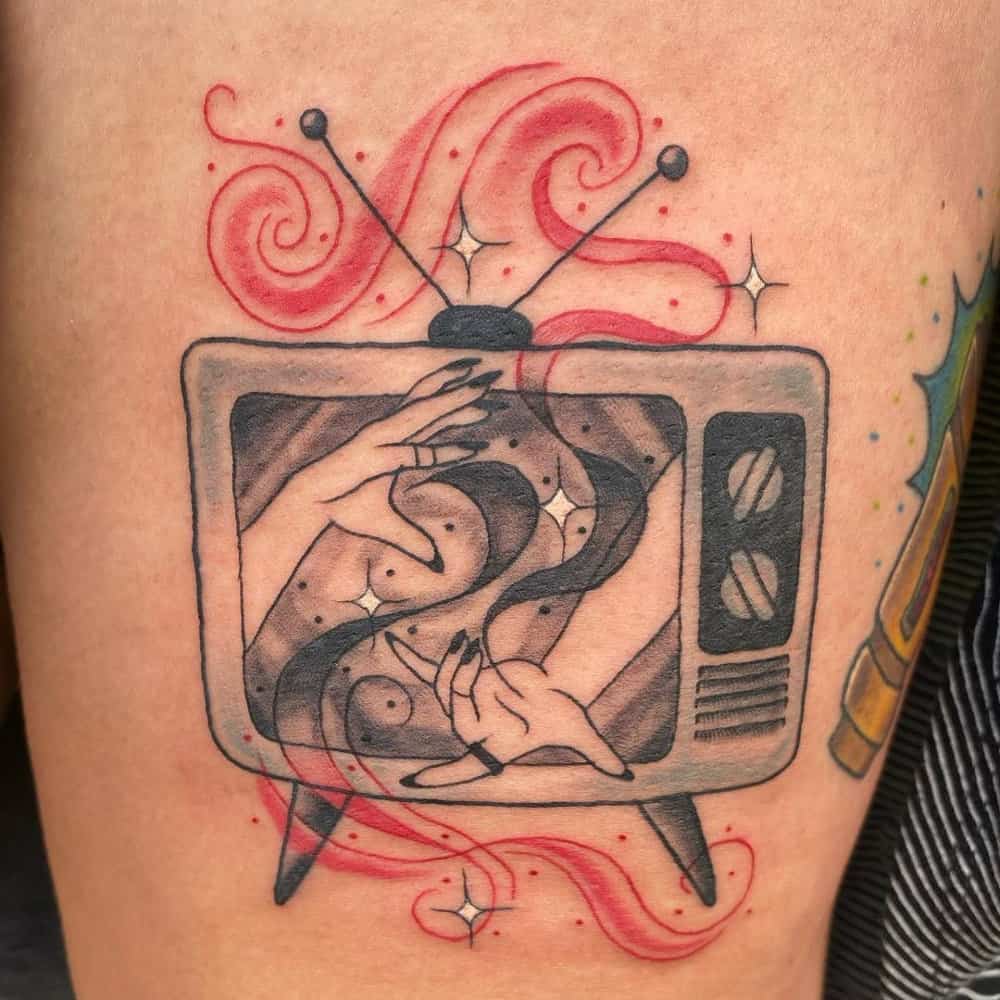 A tattoo in the shape of a television set and Wanda's two witching hands in it