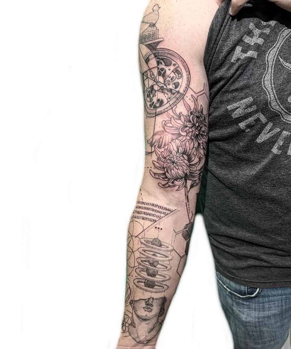 Full arm tattoo depicting scientific objects