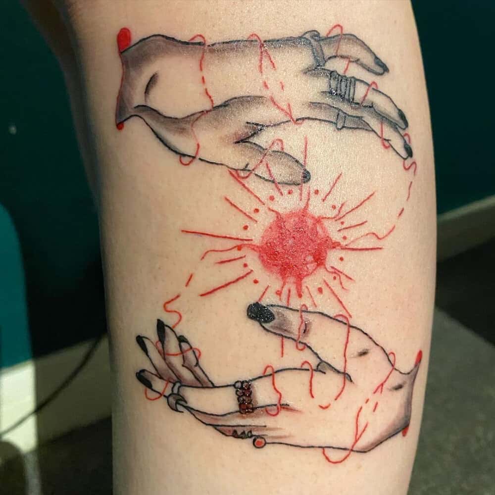 Tattoo depicting Wanda's two hands, during witchcraft