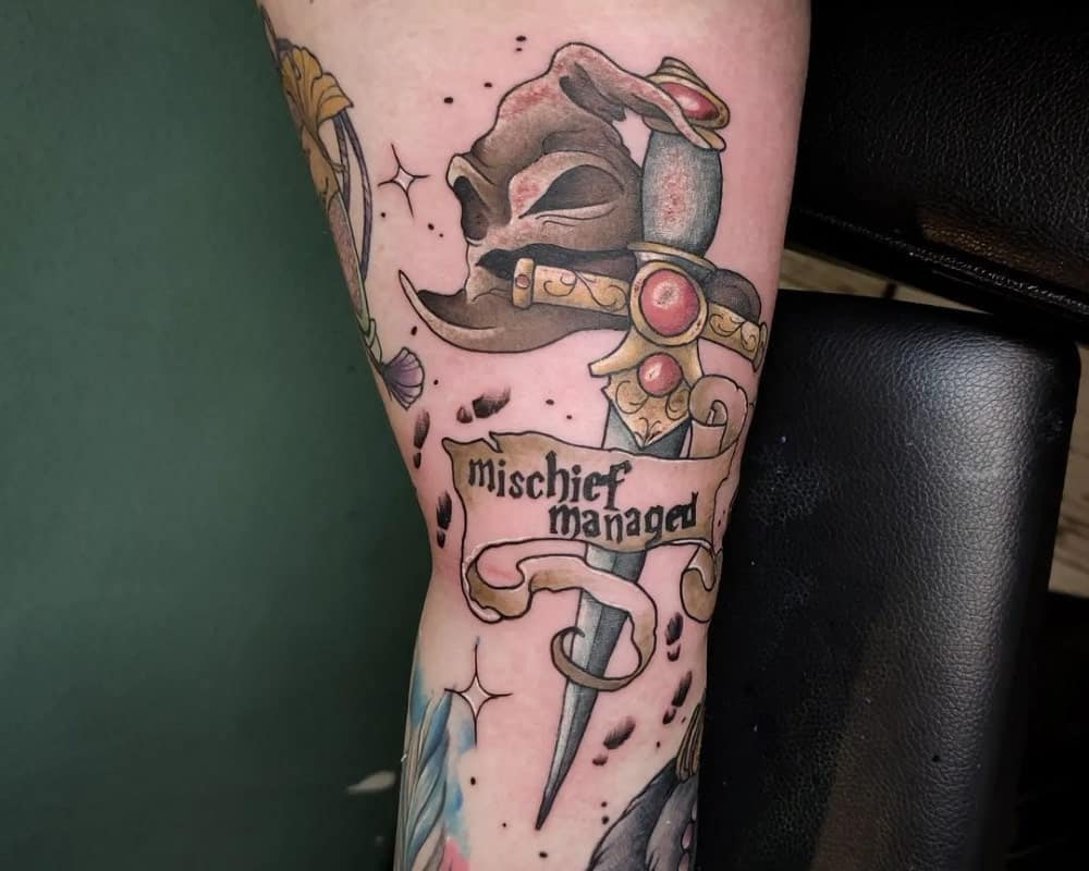 Tattoo of Sorting Hat, Sword of Gryffindor and write mischief managed