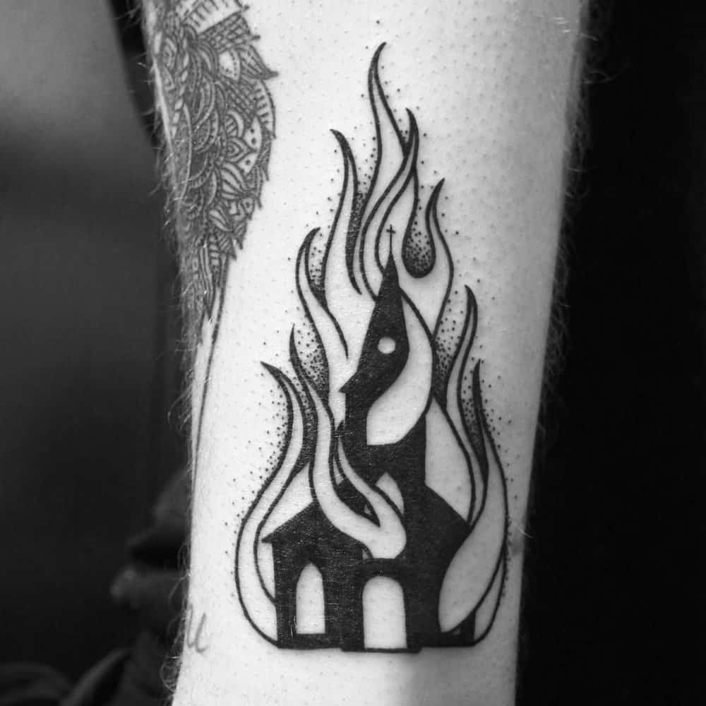 Tattoo of a burning church