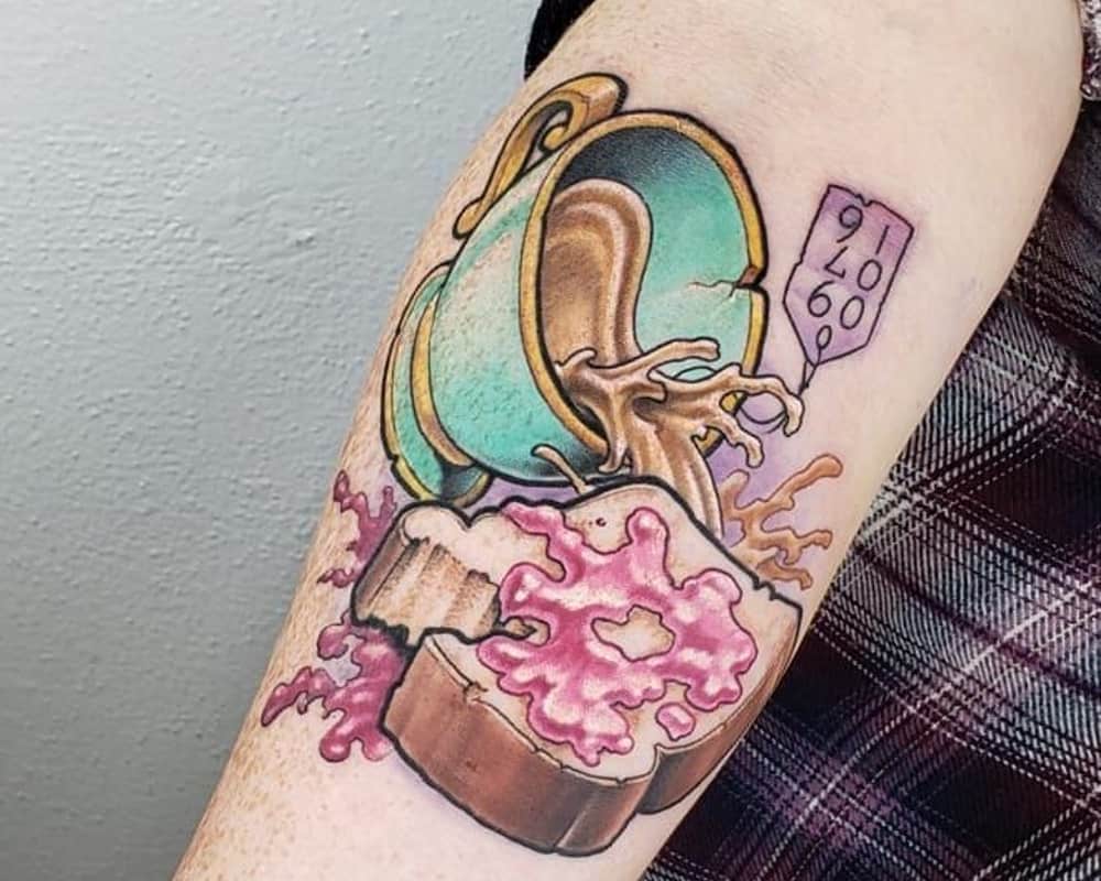 tattoo of cup of coffee and toast with jam