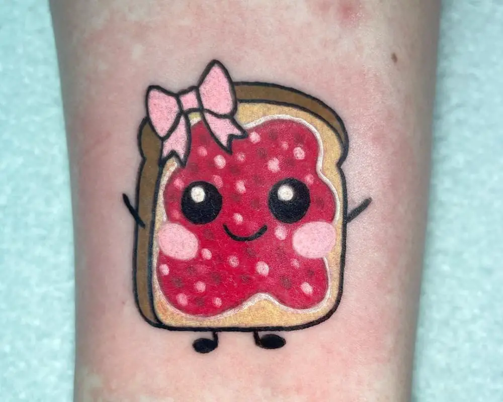 cute toast tattoo with pink jam and a bow