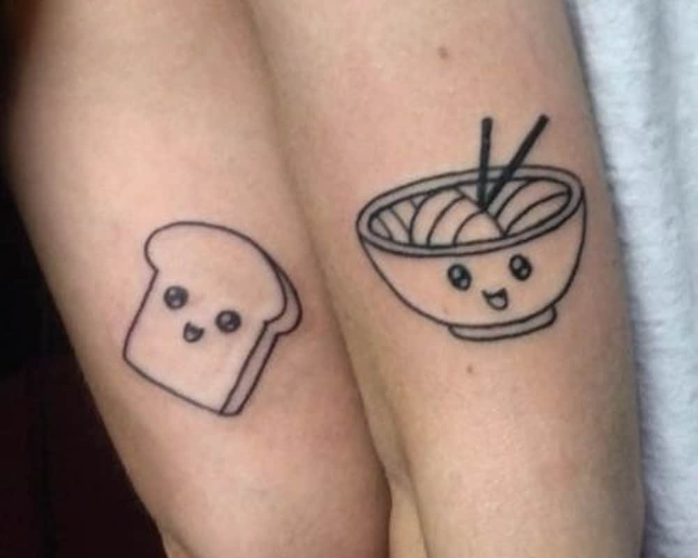 paired tattoos of cute toast and noodles on the forearm