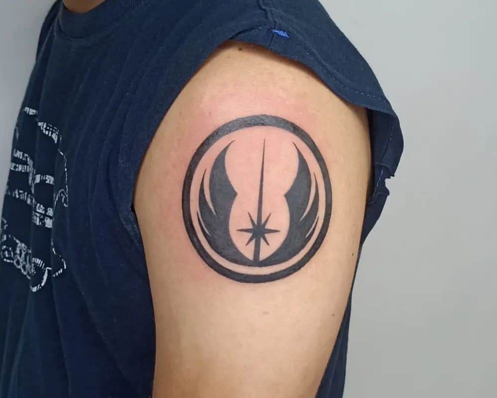 tattoo of Alliance Starbird on the shoulder
