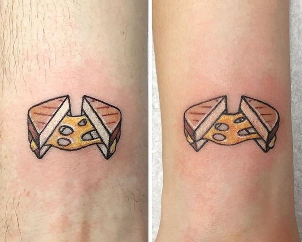 tattoo of toast with cheese in the shape of triangles