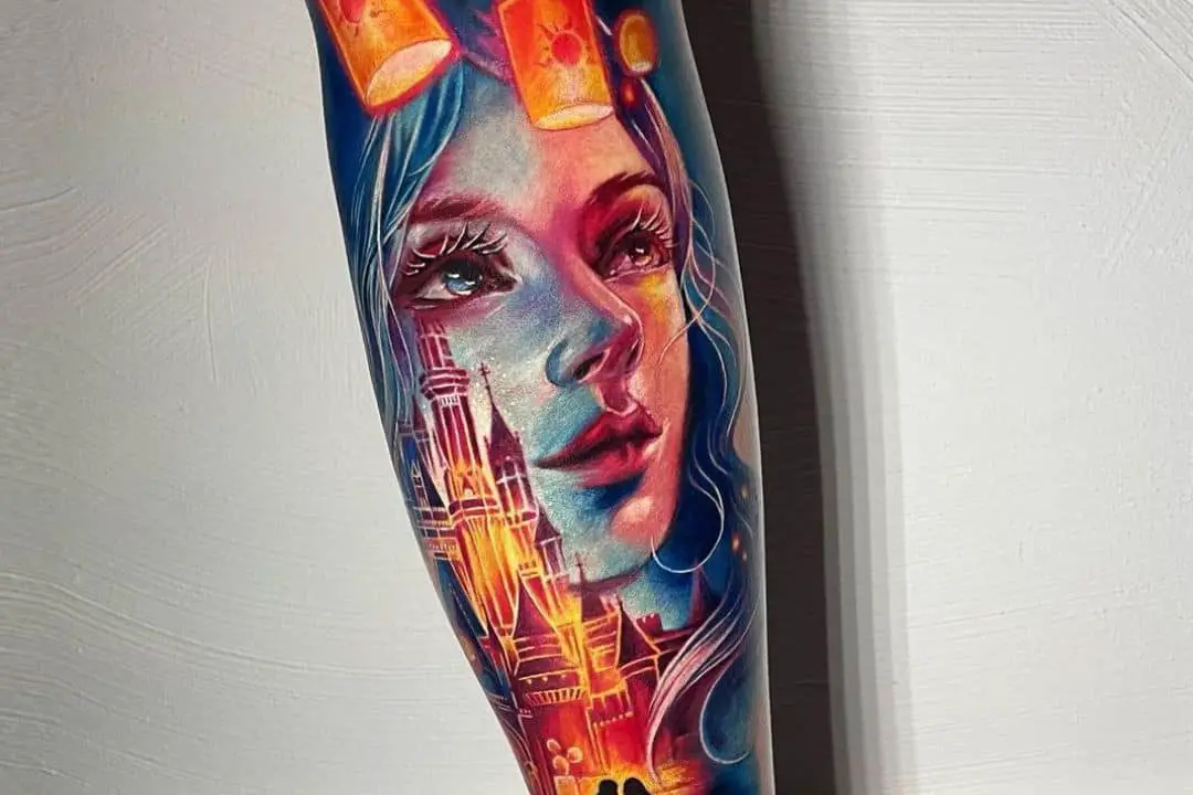Woman's face in red and blue tattoo