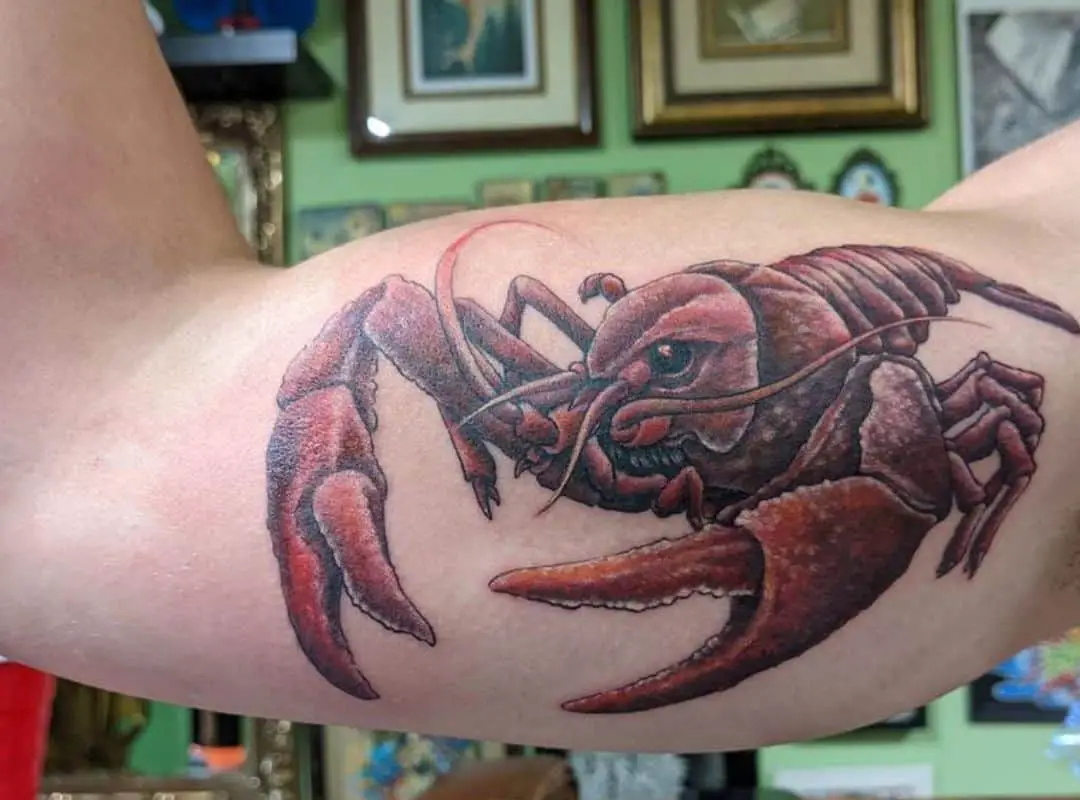 3D red crawfish biceps tattoo