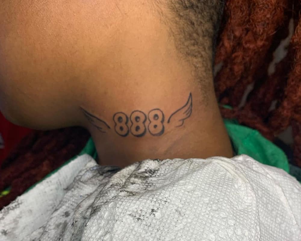 888 tattoo with wings on the neck