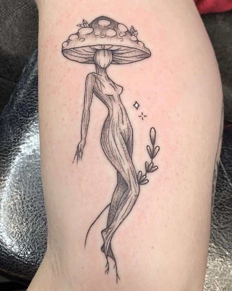 A mushroom tattoo in the shape of a beautiful girl