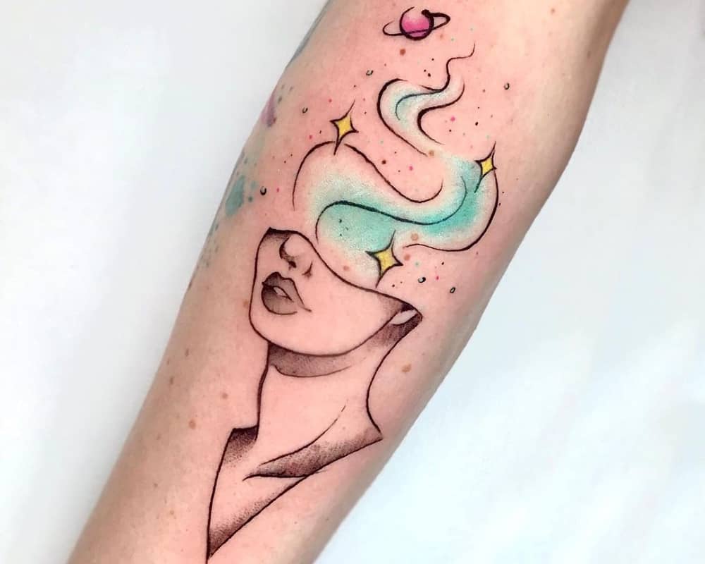 A tattoo in the shape of half a head with a blue haze inside