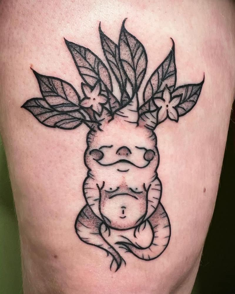 A tattoo of a meditating plant root