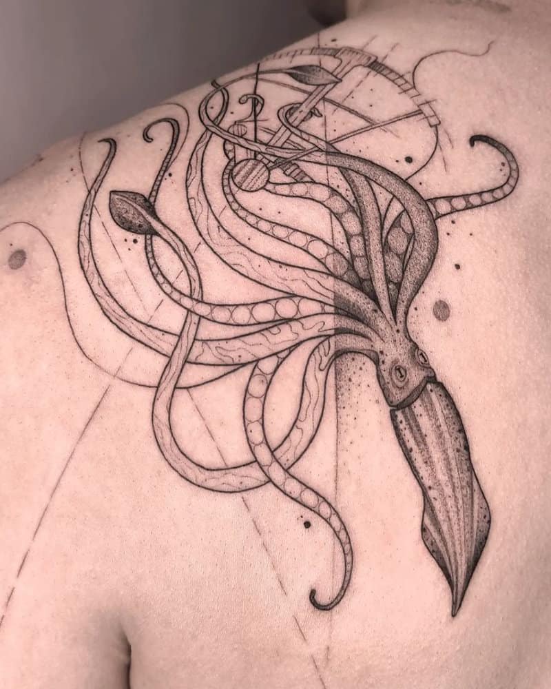 A tattoo of a squid wrapped around sextans