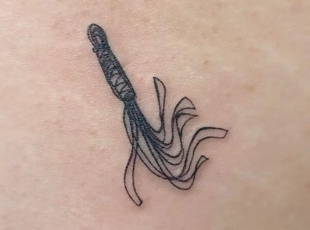 Outline whip tattoo