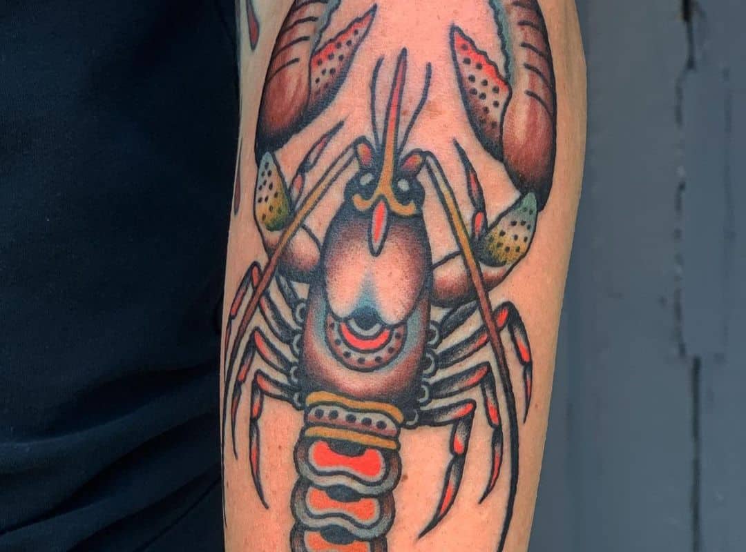 Big dark lobster hand tattoo
