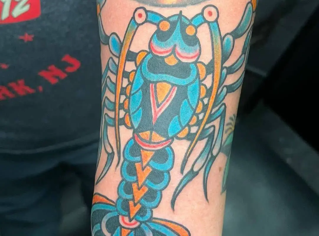 Big colorful lobster arm tattoo