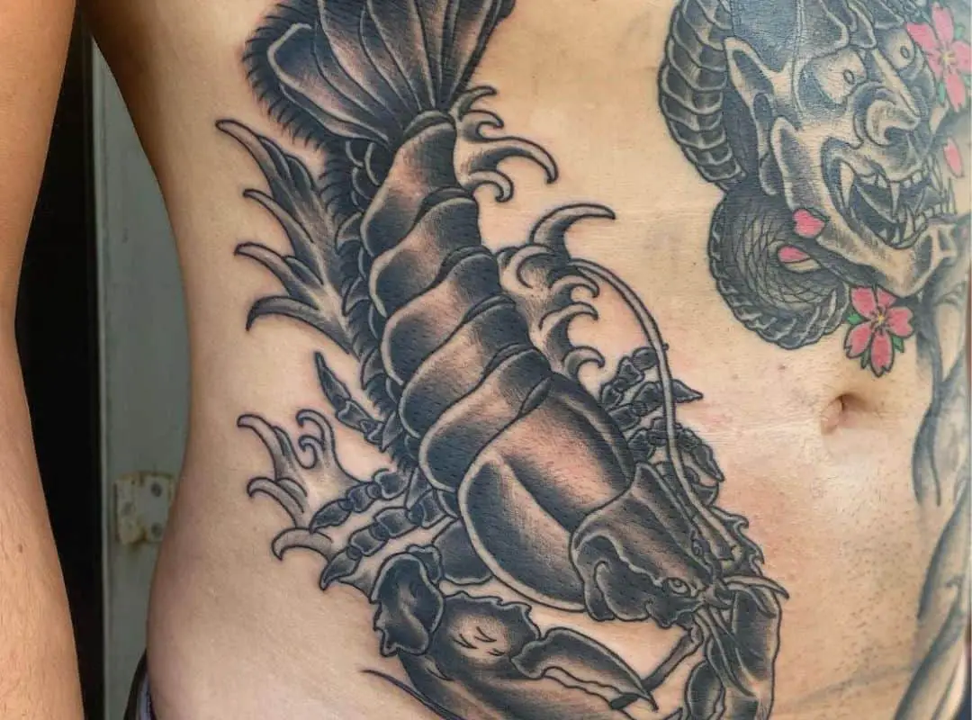 Big black lobster stomach tattoo