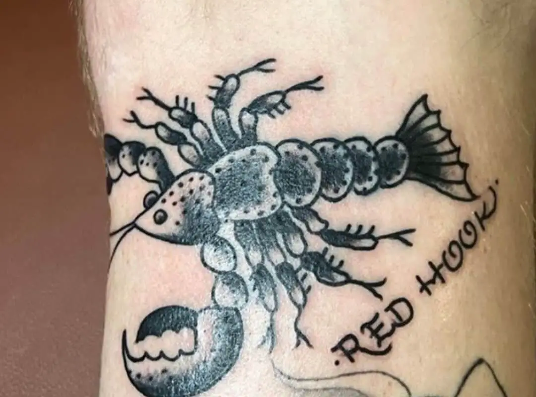 Black crawfish with a sign tattoo