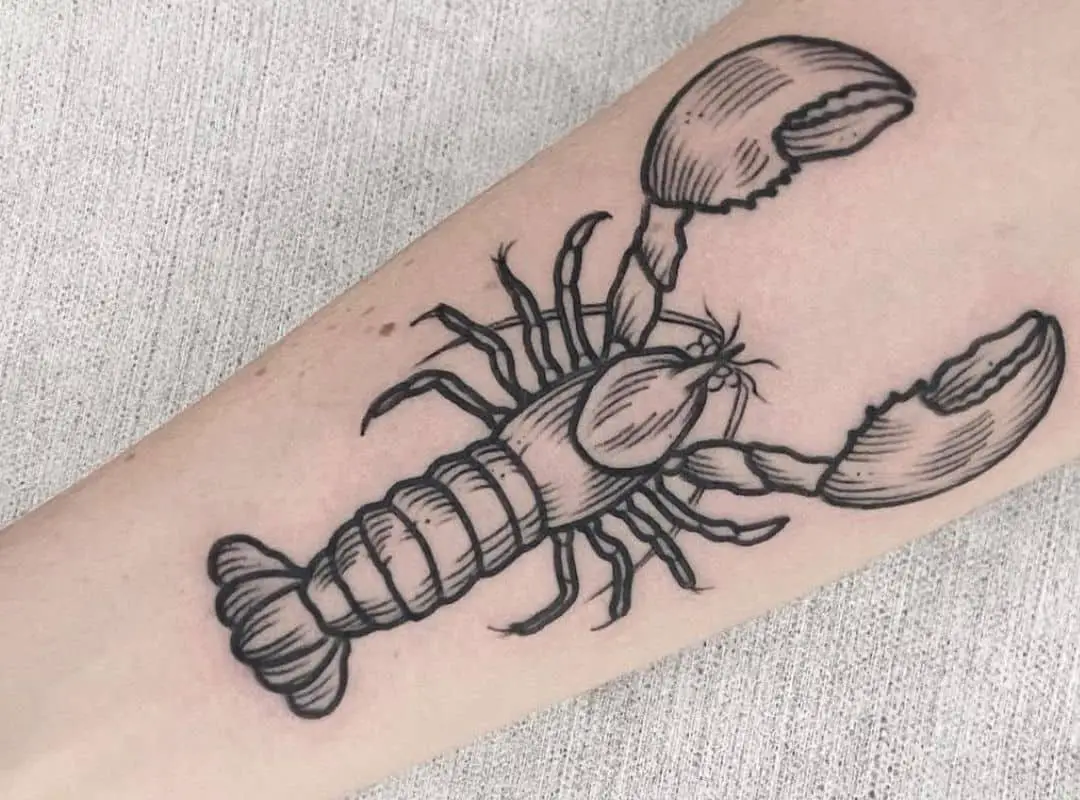 Black & white lobster hand tattoo