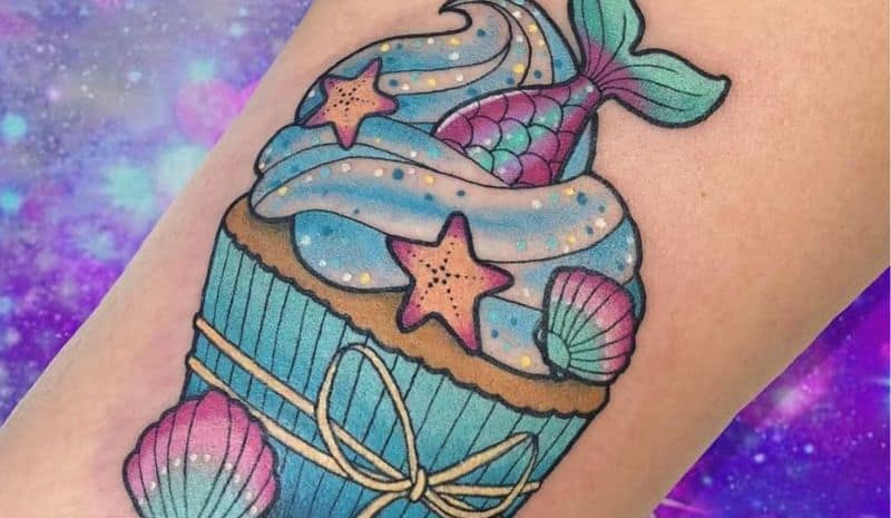 Blue cupcake with mermaid tail tattoo