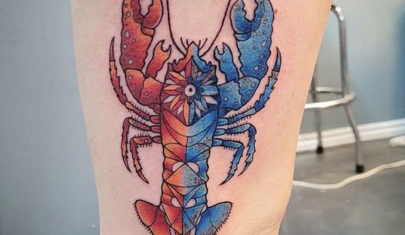 Blue&Red lobster with flower in the centre tattoo