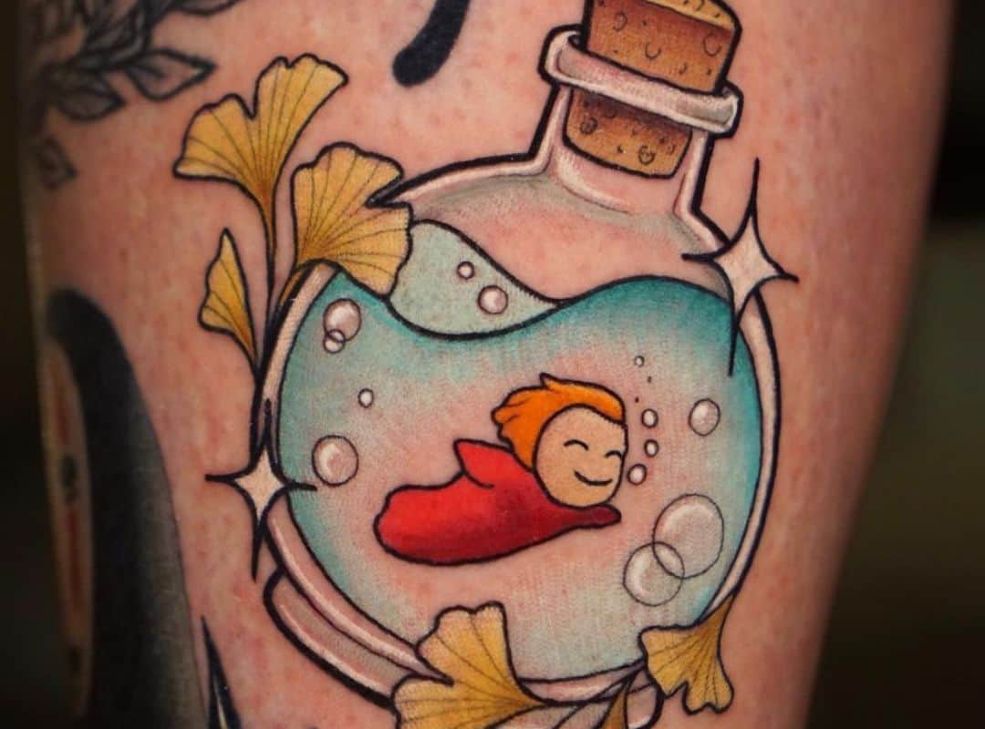 Ponyo in a bottle with flowers tattoo