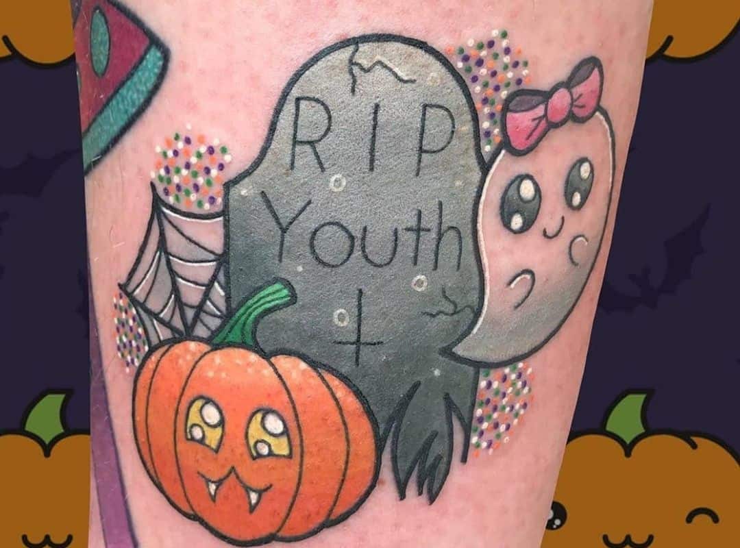 Cartoonish pumpkin and the ghost tattoo