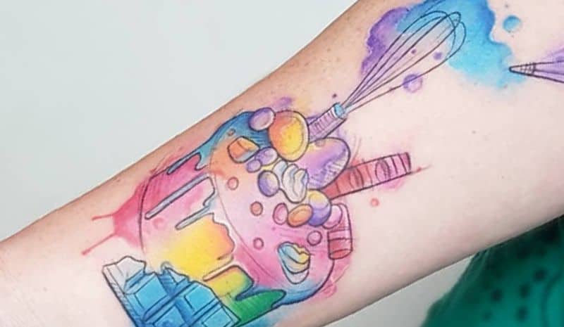 Colorful cupcake with whisk tattoo