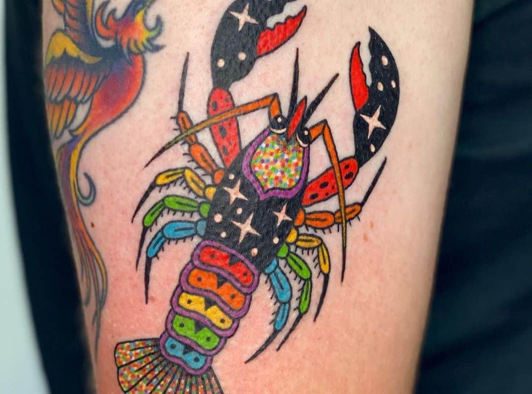 Colorful lobster with stars tattoo