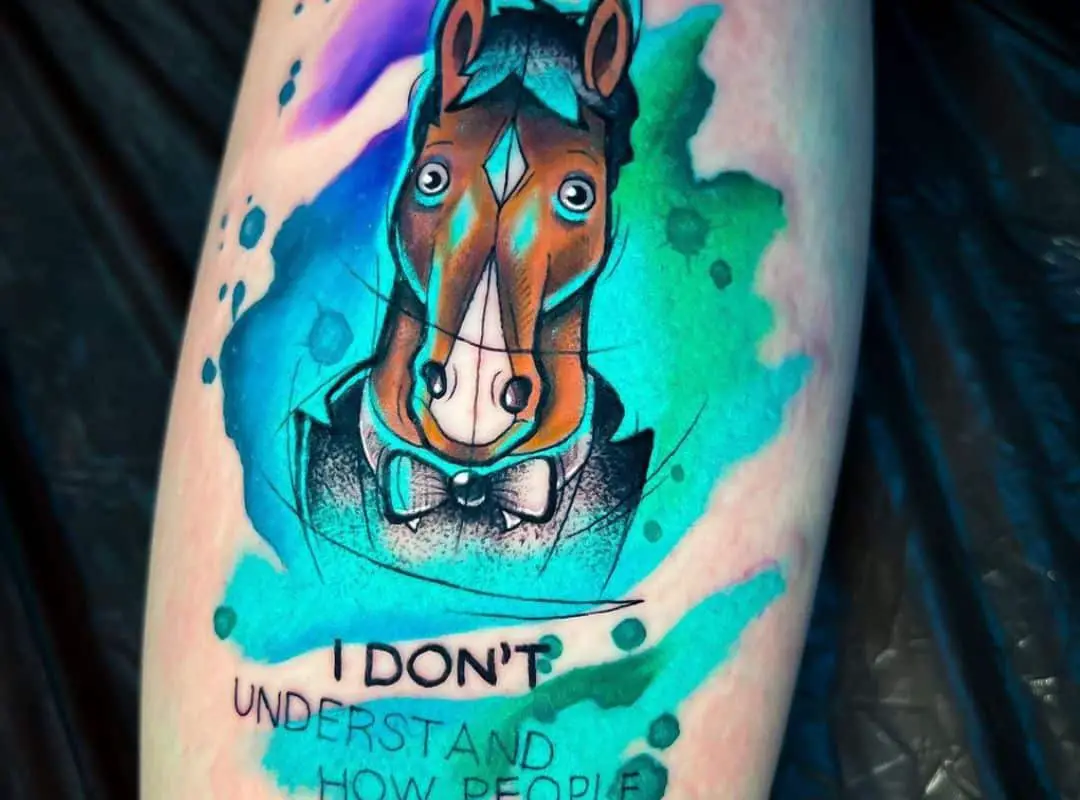 BoJack in a suit with a sign tattoo