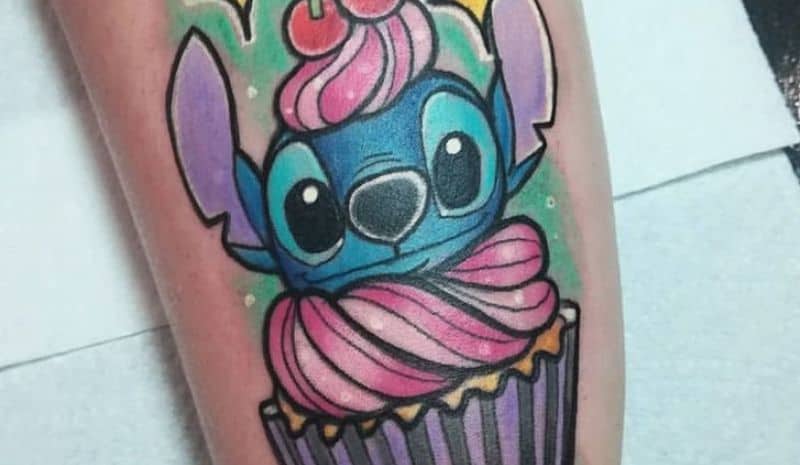 Pink cupcake with Stich and cherry tattoo