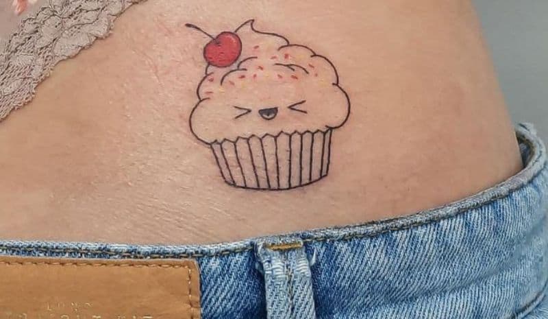 Cupcake with eyes and cherry tattoo