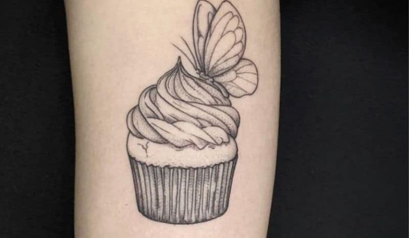 Cupcake with butterfly tattoo