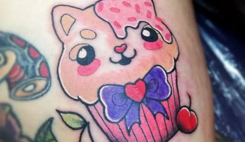 Cat cupcake with bow tattoo