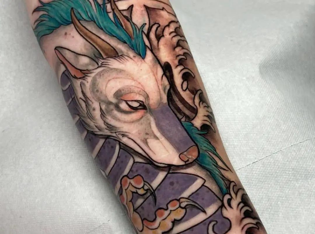 Arm sleeve tattoo with Haku 
