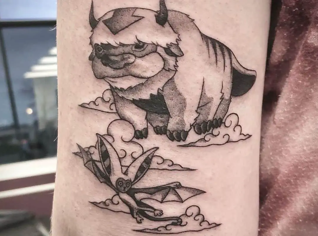 Outline flying Appa and Momo tattoo