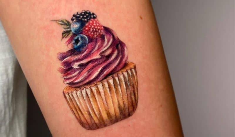 Pink cupcake with berries tattoo