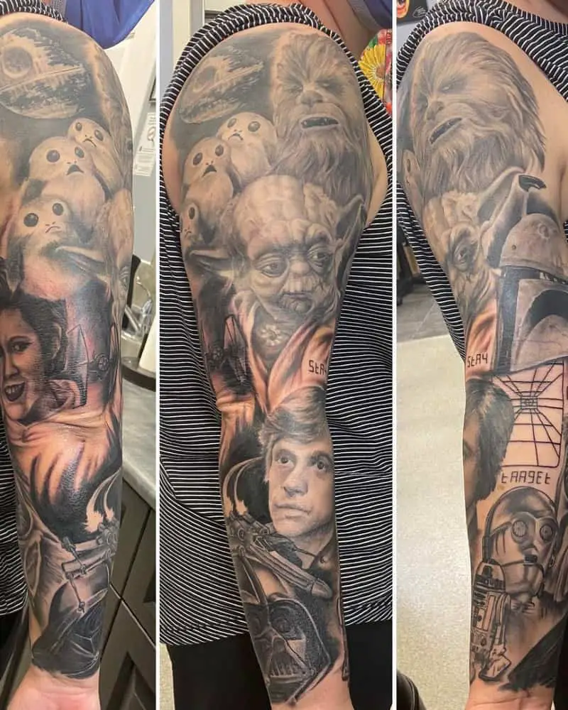 Full sleeve tattoo with Chewbacca, Princess Leia, Skywalker, Yoda, Darth Vader