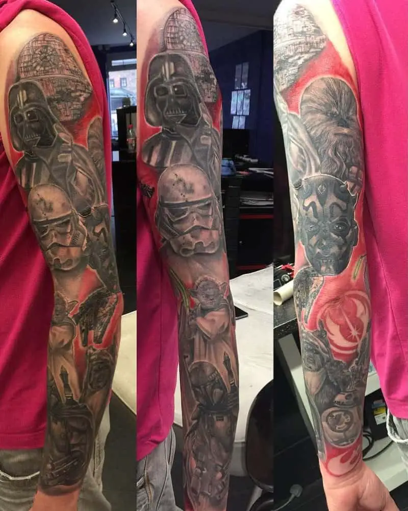 Full sleeve tattoo with R2-D2, Chewbacca, Darth Maul, Darth Vader, Boba Fett, Yoda
