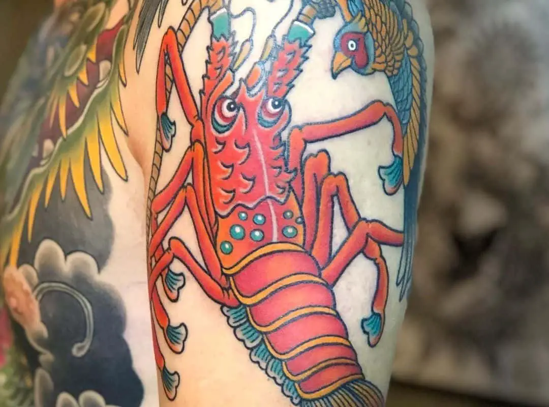 Giant lobster and a big bird tattoo