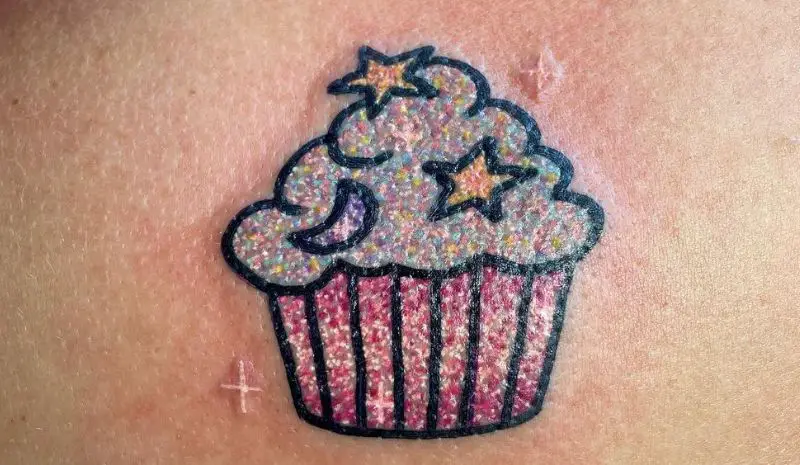 Cupcake with moon and stars tattoo